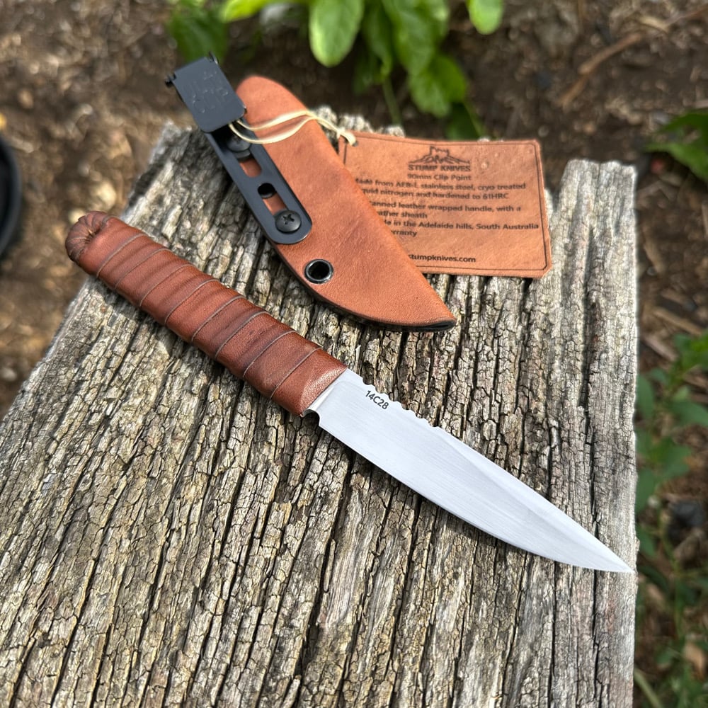 Image of 90mm clip point 14c28 leather