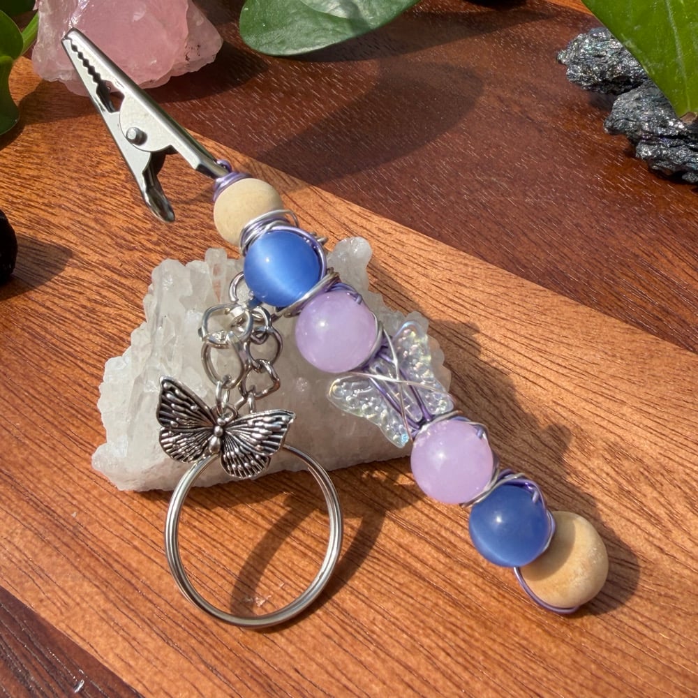 Image of indigo monarch clip keychain