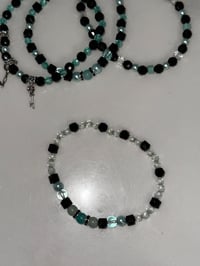 Image 3 of Teal and Black Midnight Glitz’s Tumbler Bracelet Stack