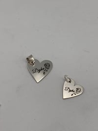 Image 1 of Cursive Dyke Charm
