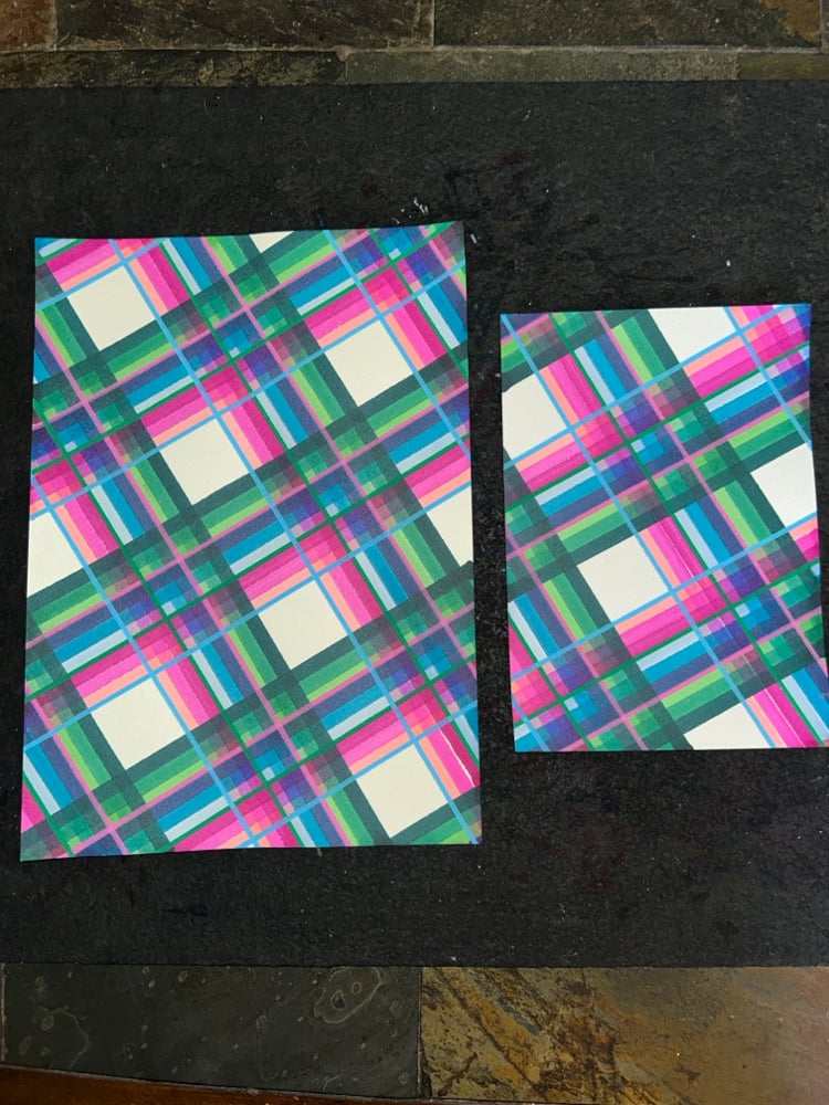 Image of Interwoven Pink, Blue and Teal Ribbons of Light