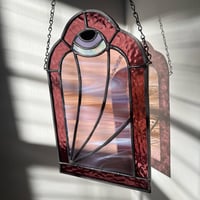 Image 1 of purple wispy eye portal