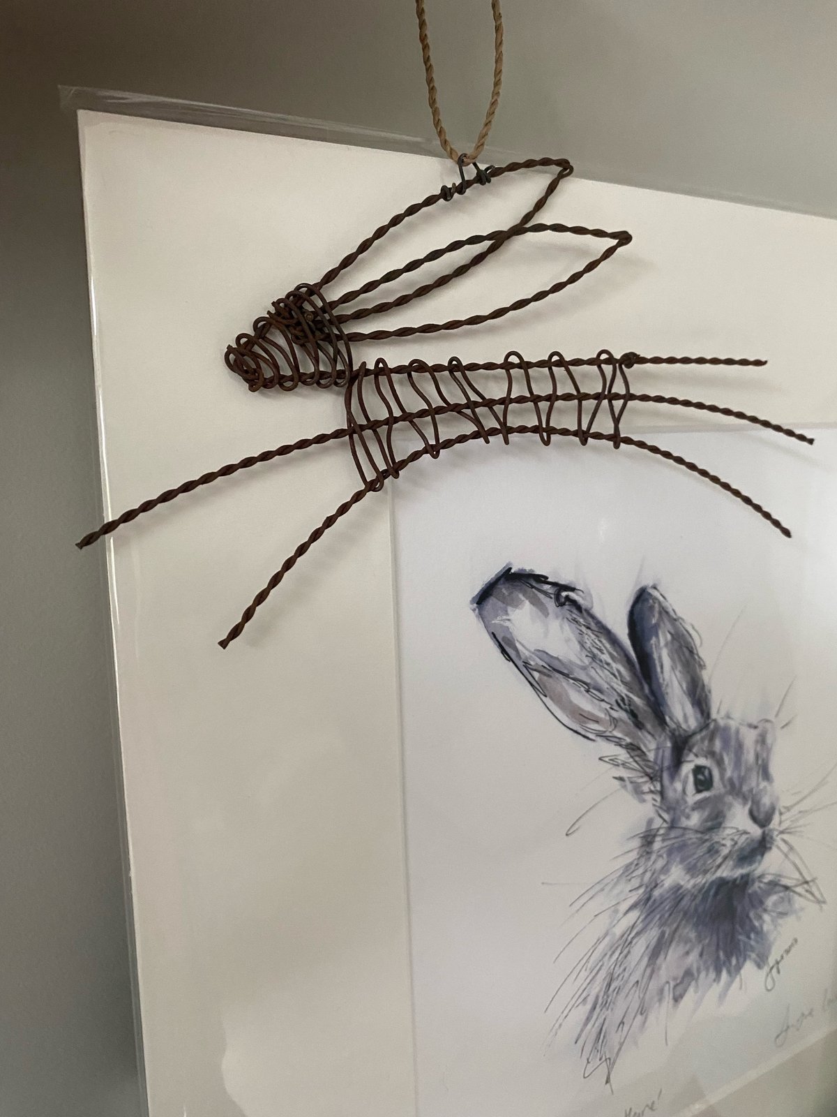 Image of HANGING RUSTED HARE DECOR 
