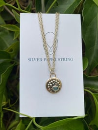 Image 2 of Small stg sil and 9ct gold aquamarine pendant