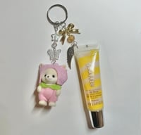 Image 3 of calico critter lipgloss keychains