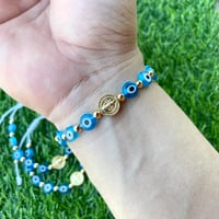 Image 1 of San Benito with Evil Eye