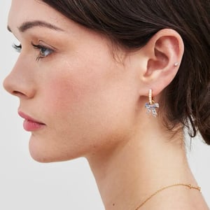 Image of Fable Pearl Bow Huggie Earrings