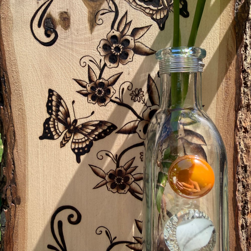 Image of traditional vine propagation station wood art 