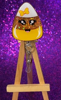 Image 1 of Candy corn badge reel