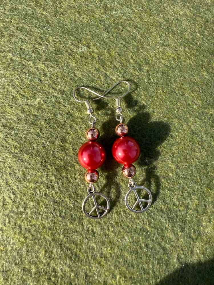 Image of โค๏ธโฎ๏ธโจ Red and gold peace sign earringsโค๏ธโจโฎ๏ธ