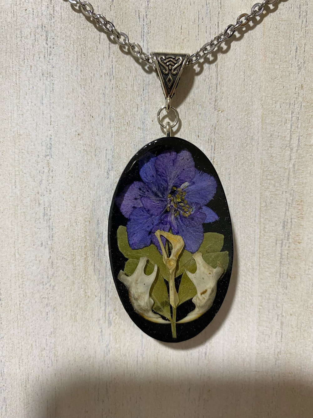 Jaw and Hip Bone Floral Pendant 