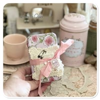 Image 2 of A Petite French tin with a needle book and tattered pin cushion