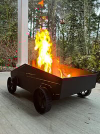 Image 1 of CyberTruck fire pit 
