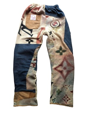 Image of Nwn- Woven monogram Straight legged Utility Trousers with Knit Mock denim and Work grade Khaki