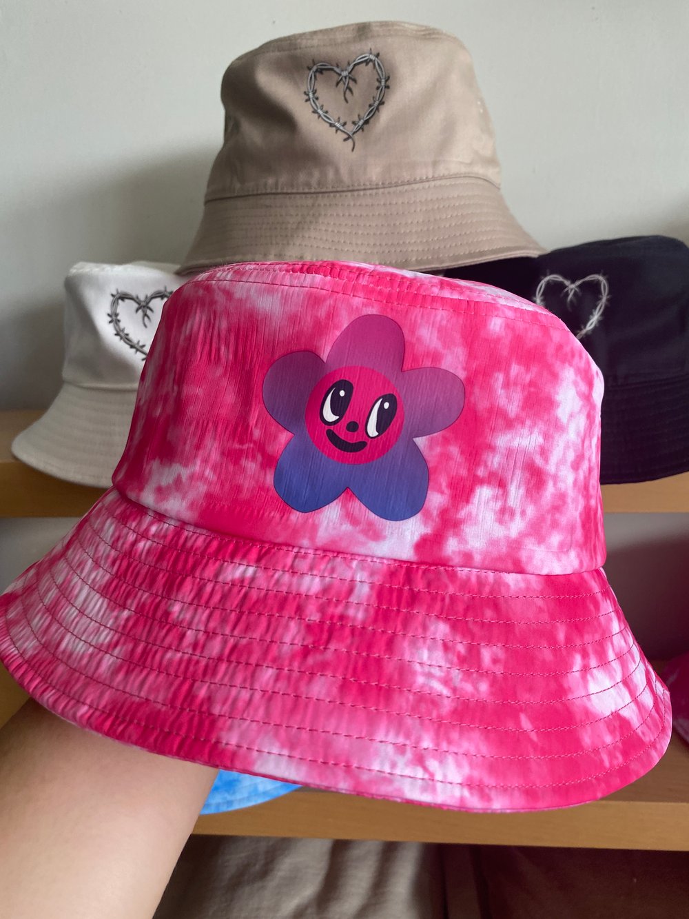 Image of TIE DYE FLOWER BUCKET HAT