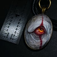 Image 14 of Pennywise Eye glow in the dark pendant OOAK