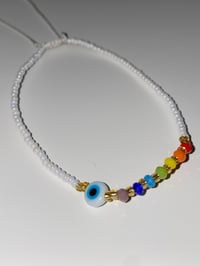 Image 2 of White Evil eye bracelet 🌈