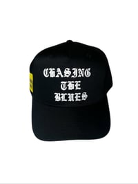 Image 1 of chasing the blues (white and black)