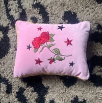 Image 1 of Pink velvet, red rose cushion with stars and gold fringe