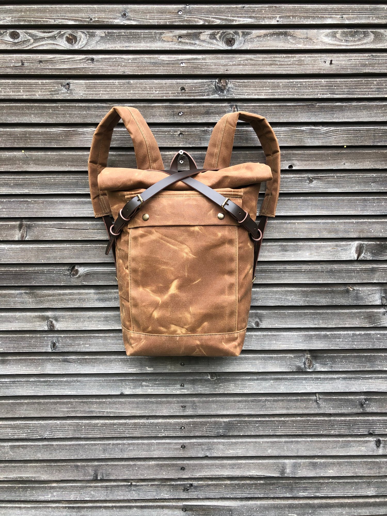 Image of Waterproof backpack medium size rucksack in waxed canvas, with volume front pocket and double layere