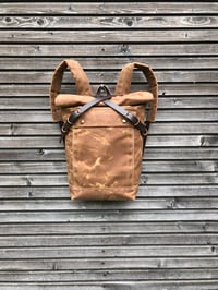 Image 3 of Waterproof backpack medium size rucksack in waxed canvas, with volume front pocket and double layere