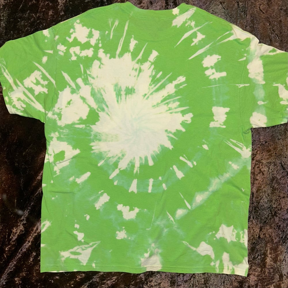 Image of green bleach dye tshirt with triple moon design 