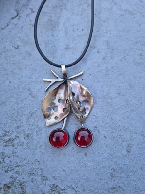 Cherry pendant with bullet casings leave  copy