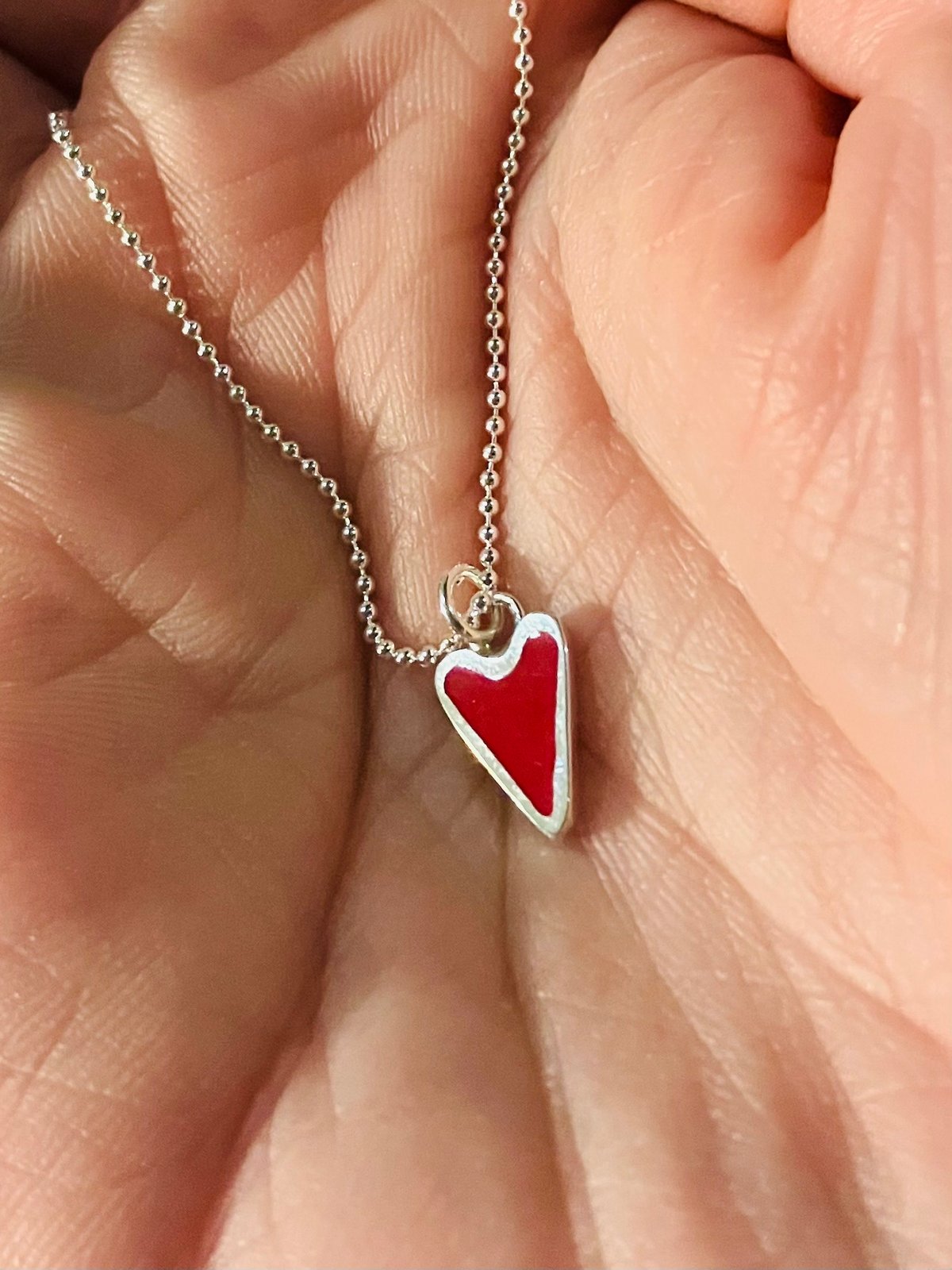 Heart in online heart pendant