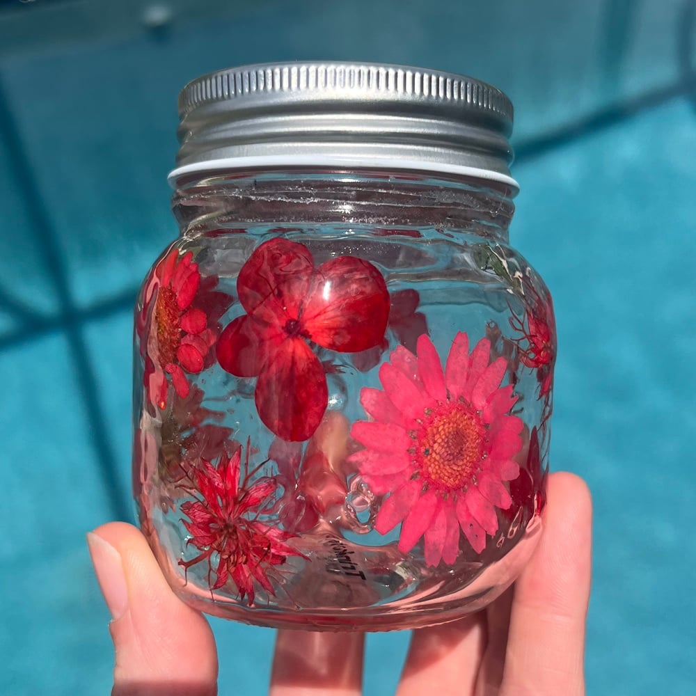 Image of red flower jar