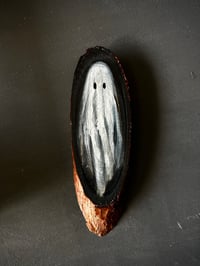 Image 1 of Fantasma sobre rodaja de madera 