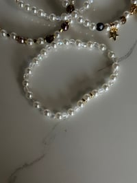 Image 6 of Starlight Shimmer | Cream and Gold  Tumbler Bracelet Stack