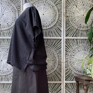 Image of Black holey overtop 