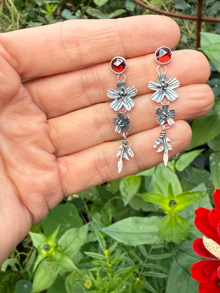 Image of Tiered Signet Marigold Flowers Leaves Garnet Stud Earrings