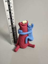 Image 9 of Blue thing hugging a red thing