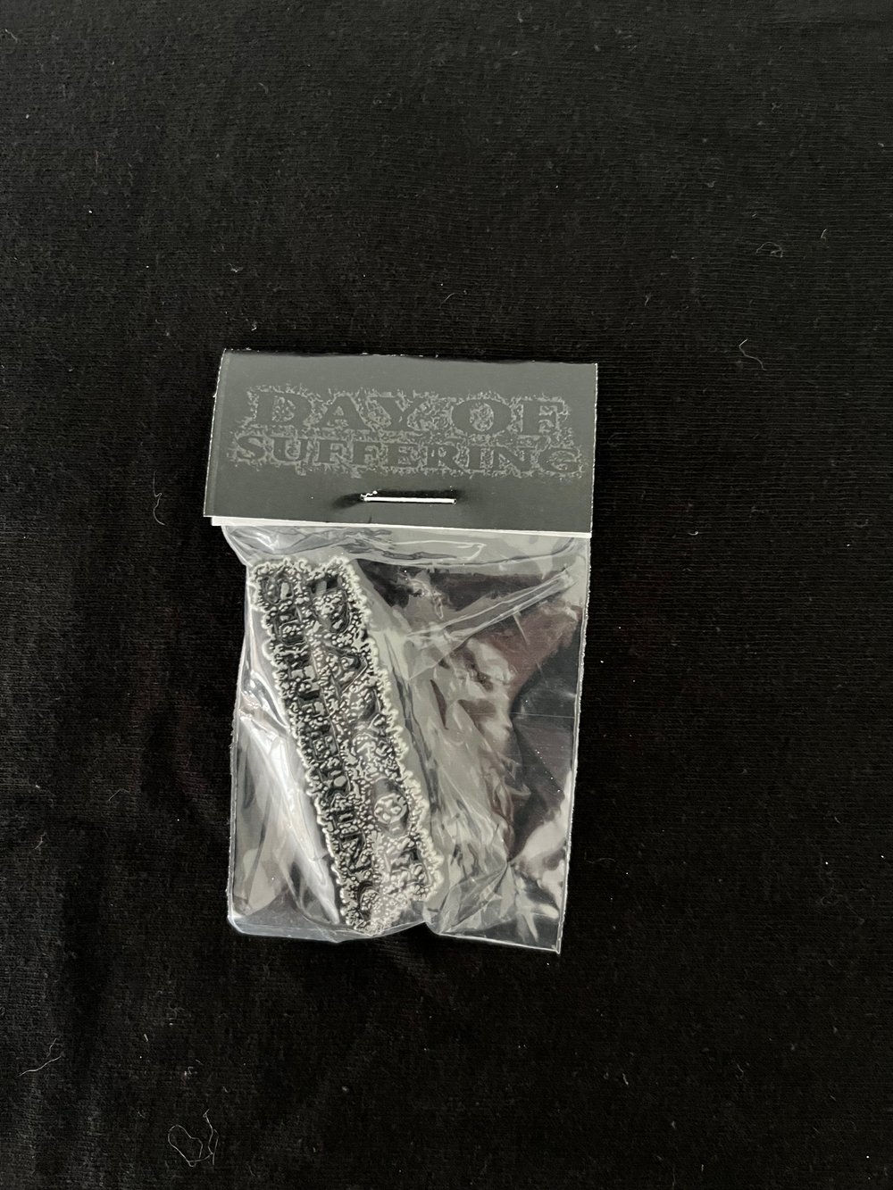 Day of Suffering logo enamel pin