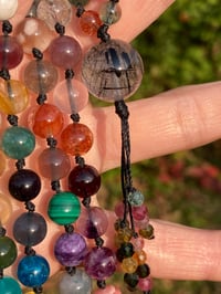 Image 8 of Rainbow Gemstone Hand Knotted Necklace with Tourmalinated Quartz Focal Bead and Rainbow Tassel