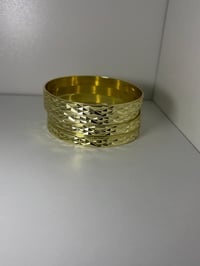 Image 1 of 4 Gold bangles 
