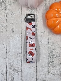 Image 1 of Cowboy Pumpkins Wristlet Keychain