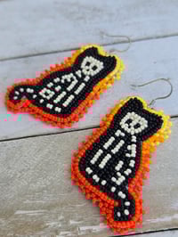 Image 2 of Orange Skeleton Cat earrings 