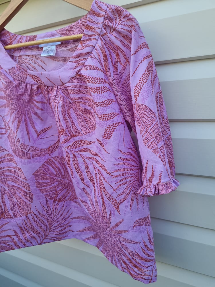 Image of TUNIC TOP in TROPICAL LILAC. Size Small & Large