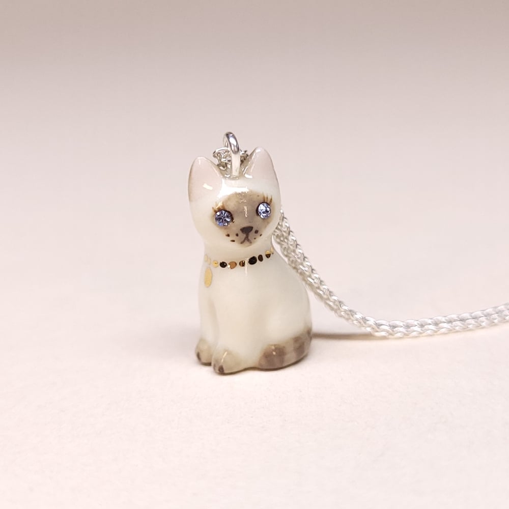 Image of Lilac Point Siamese Porcelain & Sterling Silver Sitting Kitten Pendant