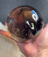 Image 15 of Golden Rutile In Smoky Quartz Sphere #1769