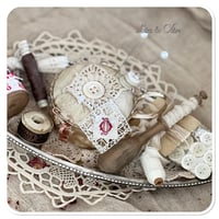 Image 3 of Handmade pin cushion sitting on a silver tray full of French sewing notions