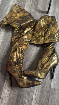Metallic thigh boots 