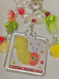 Image 2 of juminocore hungry caterpillar keychain