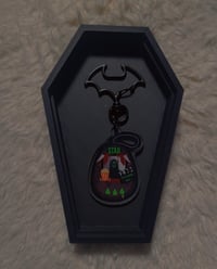 Image 1 of Stab Tamagotchi Charm