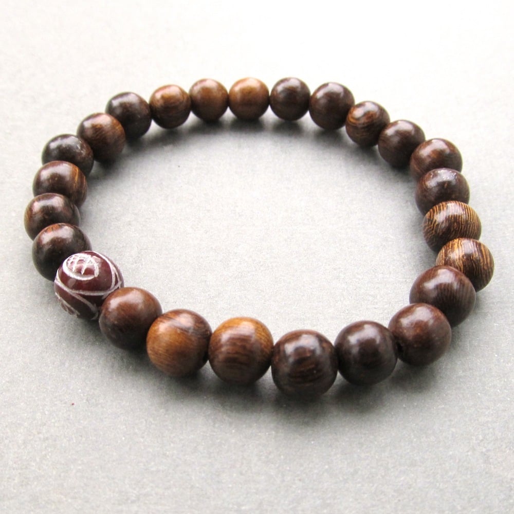 Image of Mens brown robles beaded stretch bracelet with chinese serpentine bead