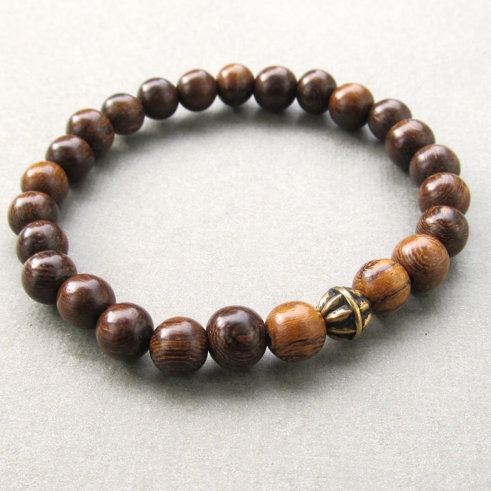 Image of Brown robles beaded stretch bracelet with antique gold bead
