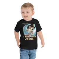 Image 1 of I Ride With Jesus Surfing Dark Toddler Short Sleeve Tee