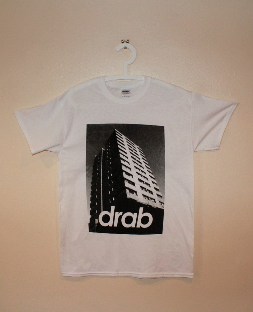 Image of drab building tee